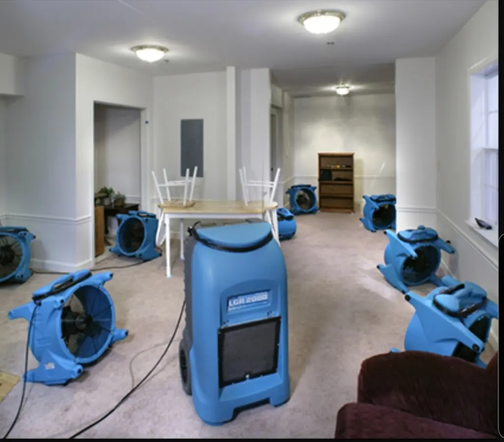 Air movers and dehumidifier setup for Water Damage Restoration in Hamilton
